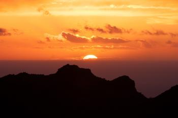 Silhouette of Mountain Under Sunset