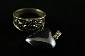 Silver ring and a heart necklace