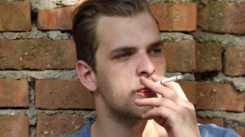 Young Man Smoke Cigarette Sad Hipster Smoker Person Sitting Back Red ...