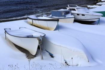 Snow covered fishing boats