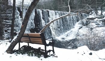 Snow Covered With Brown and Black Steel Couch