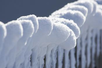 Snow on the Fence