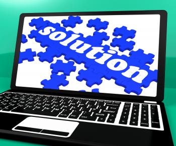 Solution Puzzle On Notebook Showing Computer Applications