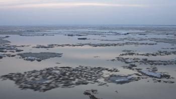 4k Time-lapse Sunset. Ice drift on the river. In the spring the ice ...
