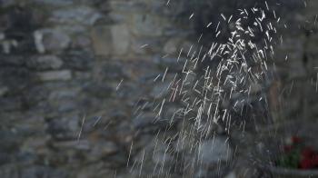 PLYMOUTH, UK - the sprinkling water from a fountain in the ...