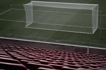 Stadium Seats Near White Soccer Goal