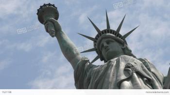 Time Lapse Tilt Up Of Clouds Behind The Statue Of Liberty In This ...