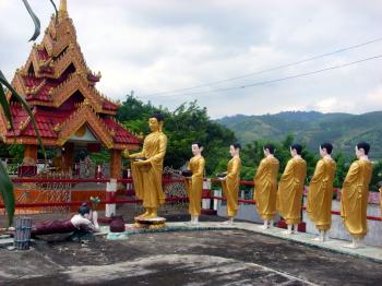 Statues of Buddha and followers