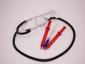 Stethoscope and Pens