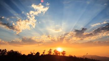 Beautiful scenic sunset with rays of sun shining through clouds 4K ...