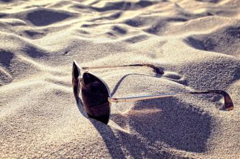Sunglasses on the Sand - Summer Concept