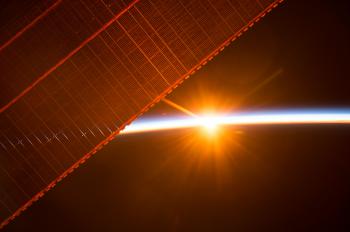 Sunrise Through the Solar Arrays | NASA