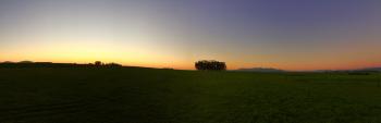 Sunrise on Green Grass Field