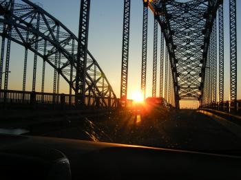 Sunset through a bridge