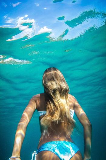 Blonde sea water swimming