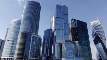 Block of modern tall skyscrapers called Moscow City, long slide shot ...