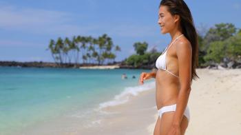 Beautiful young Asian model portrait. Bikini woman relaxing on beach ...