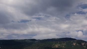 Time Lapse combined with Pan-Clouds building, and passing over ...