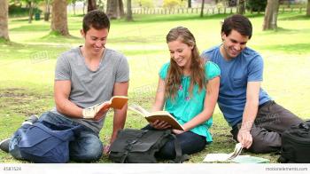 Three Friends Talking And Laughing As They Study B Stock video ...