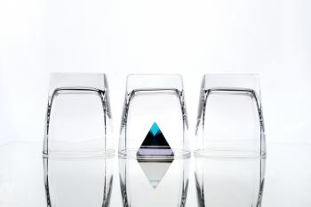 Three glasses and a pyramid