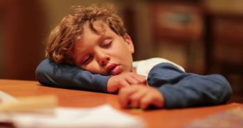 Sleepy Child Tired Fell Asleep With Head On Table Young Boy Sleeping ...