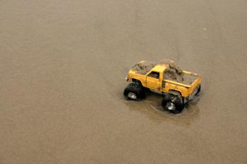 Toy car in sand