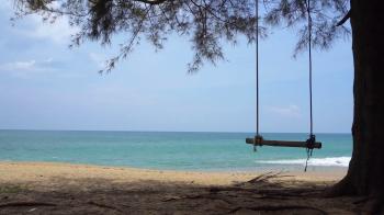 UltraHD 4K video - Small waves gently wash this peaceful. tropical ...