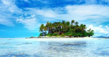 Crystal clear water of tropical sea and small island with coconut ...