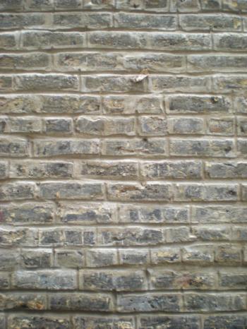 Tuckpointed Vertical Light Brick Wall