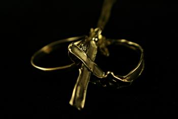 Two rings and a cross