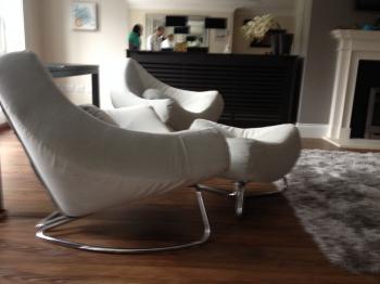 How's this for a statement? Chrome framed modern armchairs with a ...
