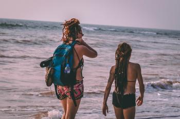 Two Woman Wearing Bikini Beside Seashore