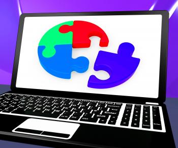 Unfinished Puzzle On Laptop Showing Teamwork