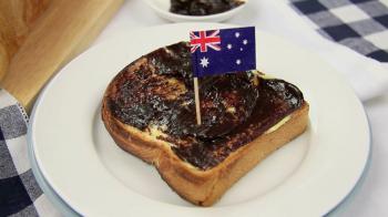 Australian flag being put in a piece of toast with vegemite. Stock ...