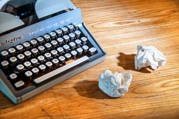 Vintage typewriter and paper