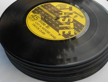 50 assorted black 7 inch vinyl records