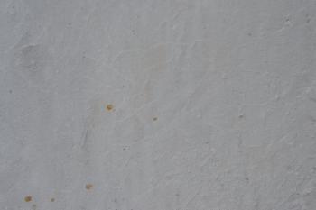 Wall texture with white paint, crack and