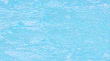 Abstract swimming pool water background. Moving water with ...