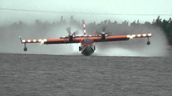 CL-415 Canadair or Bombardier Water Bomber pick up and water drop ...