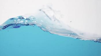 side view of blue toned water waves in slow motion, 180fps prores ...