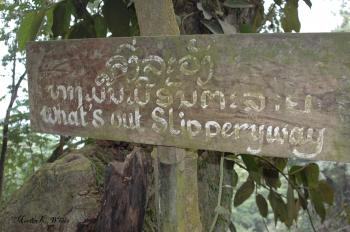 Laos waterfall signage 2005 Martin White Travel Photography