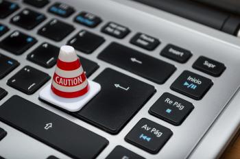 White Caution Cone on Keyboard