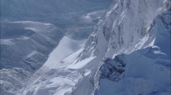 White Snow Himalaya Mountains. Steep cliffs and snow capped mountain ...