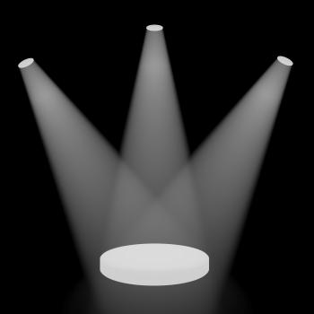 White Spotlights Shining On A Small Stage With Black Background