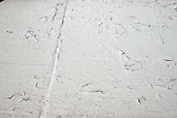 White surface with cracked paint
