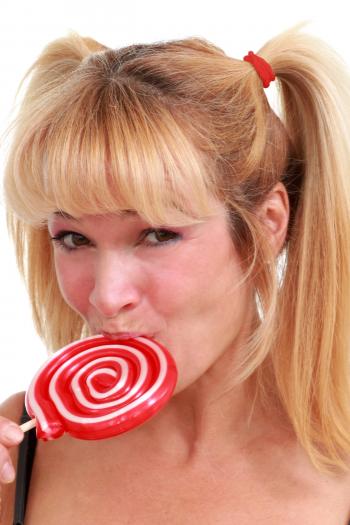 Woman enjoying a lollipop