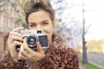 Woman Holding Black and Gray Camera Focus Photo