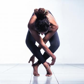 Woman in Black Pants Doing Yoga