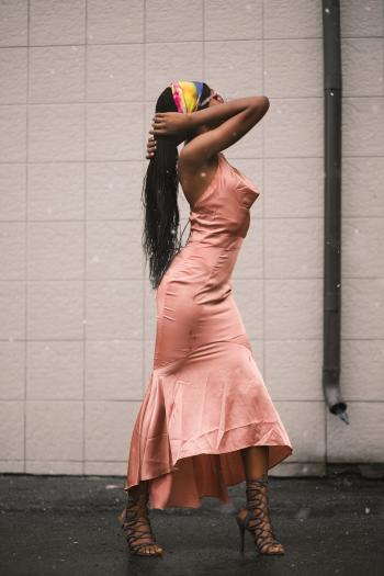 Woman in Pink Dress Hold Hair