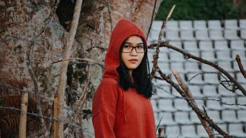 Woman In Red Pullover Hooded Jacket